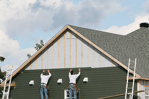 Professional Siding technician working in Zieglerville, PA
